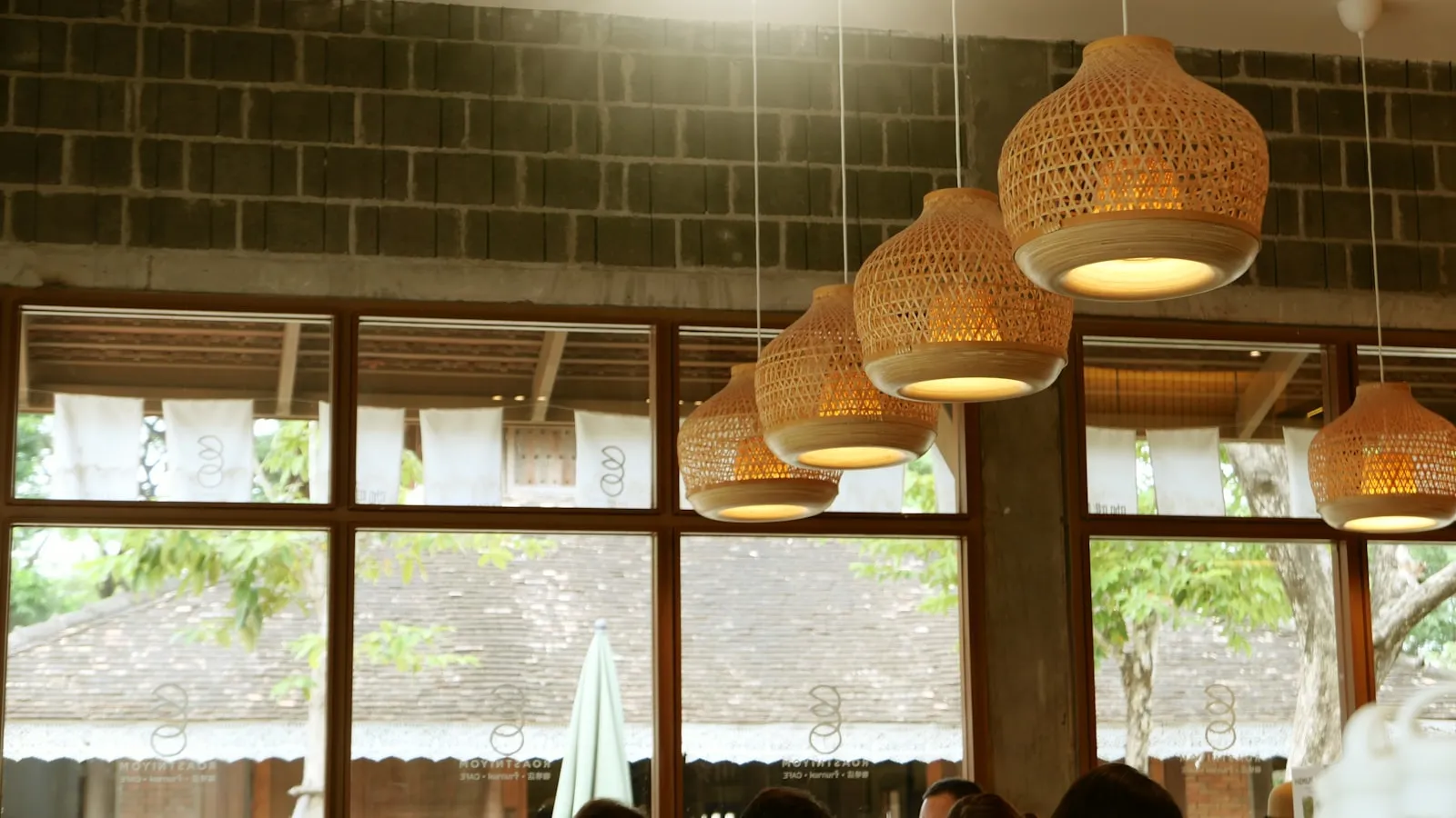 digital nomad working with laptop at cafe in chiang mai