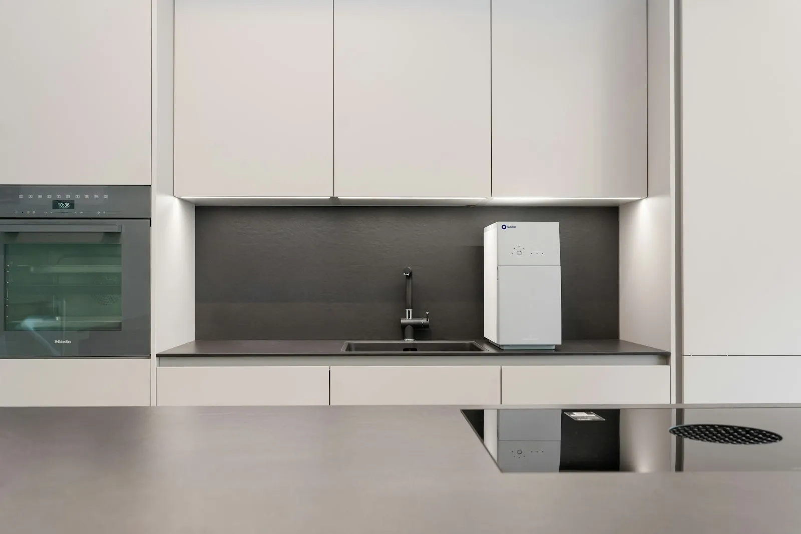 water ionizer machine on modern kitchen counter